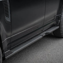 Load image into Gallery viewer, Close-up of a black vehicle with a running board on a road